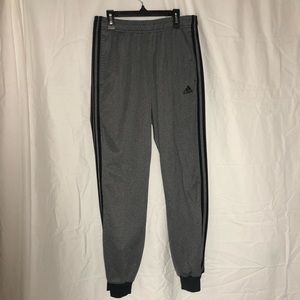 Men’s gray Adidas joggers with black stripes